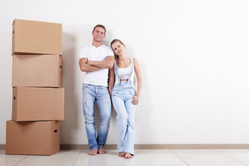 Removal team planning a Docklands apartment move with boxes and furniture