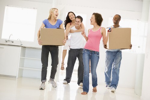 Docklands flat removal team handling apartment move near modern tower blocks