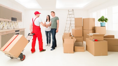 Packed boxes and moving truck prepared for a Docklands house relocation