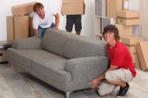 Packed boxes and furniture prepared for a house removal in Docklands